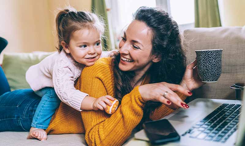 Feedback Feedback hero image - Mother and daughter smiling and having fun together